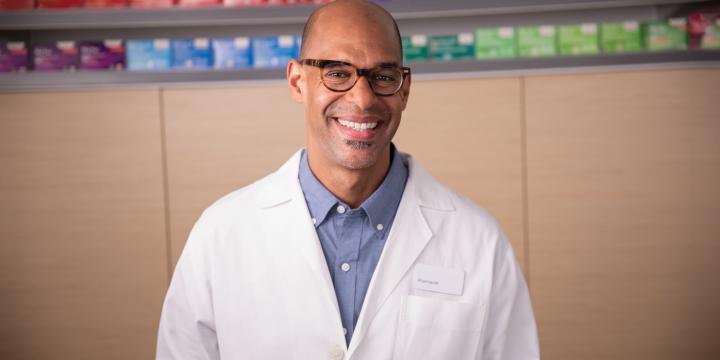 Walgreens Pharmacist smiling at the camera