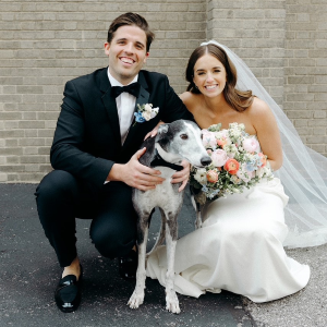 Claire Kasson, her husband and dog on wedding day