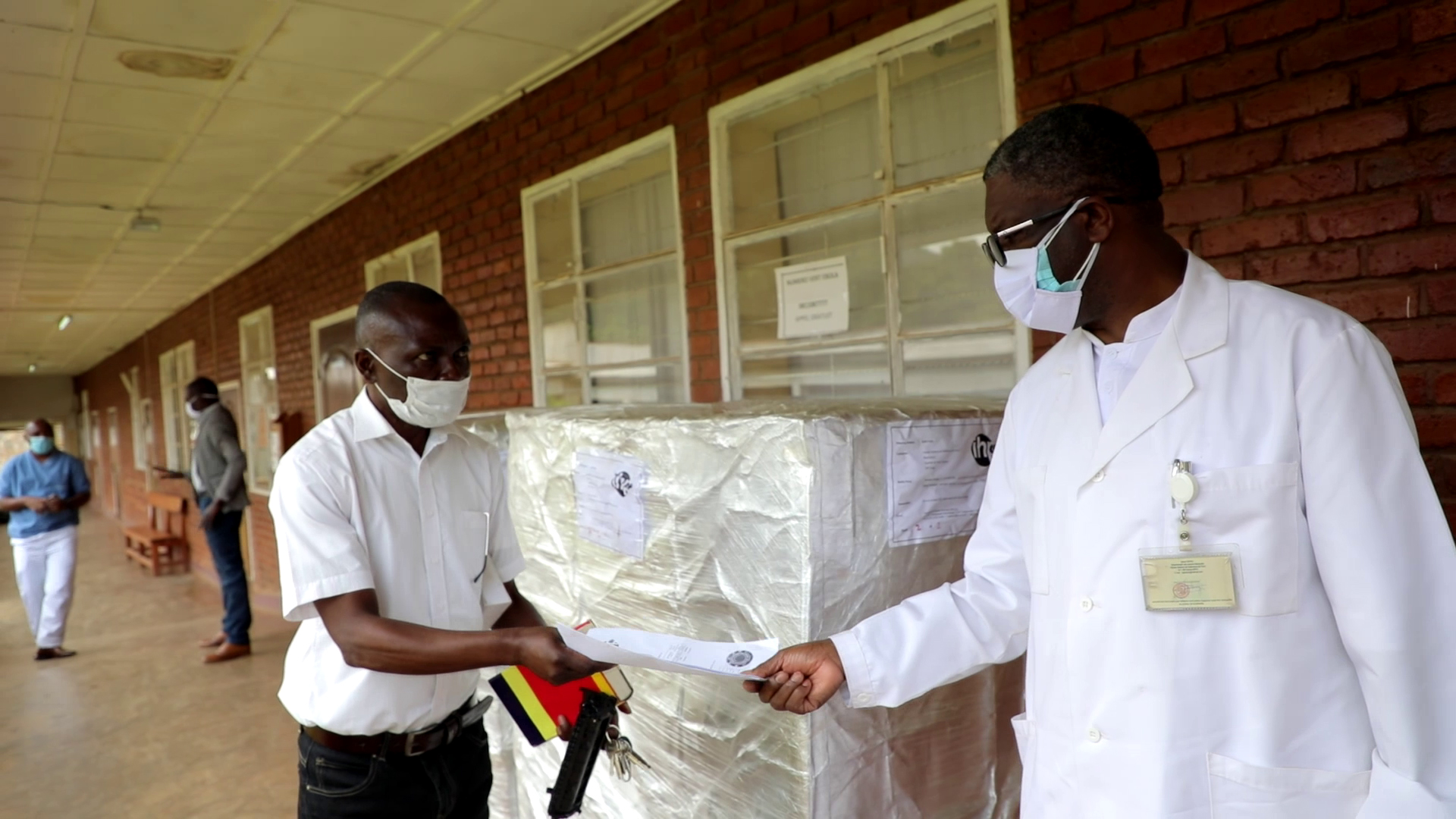 Doctor at Panzi hospital receiving donations shipment