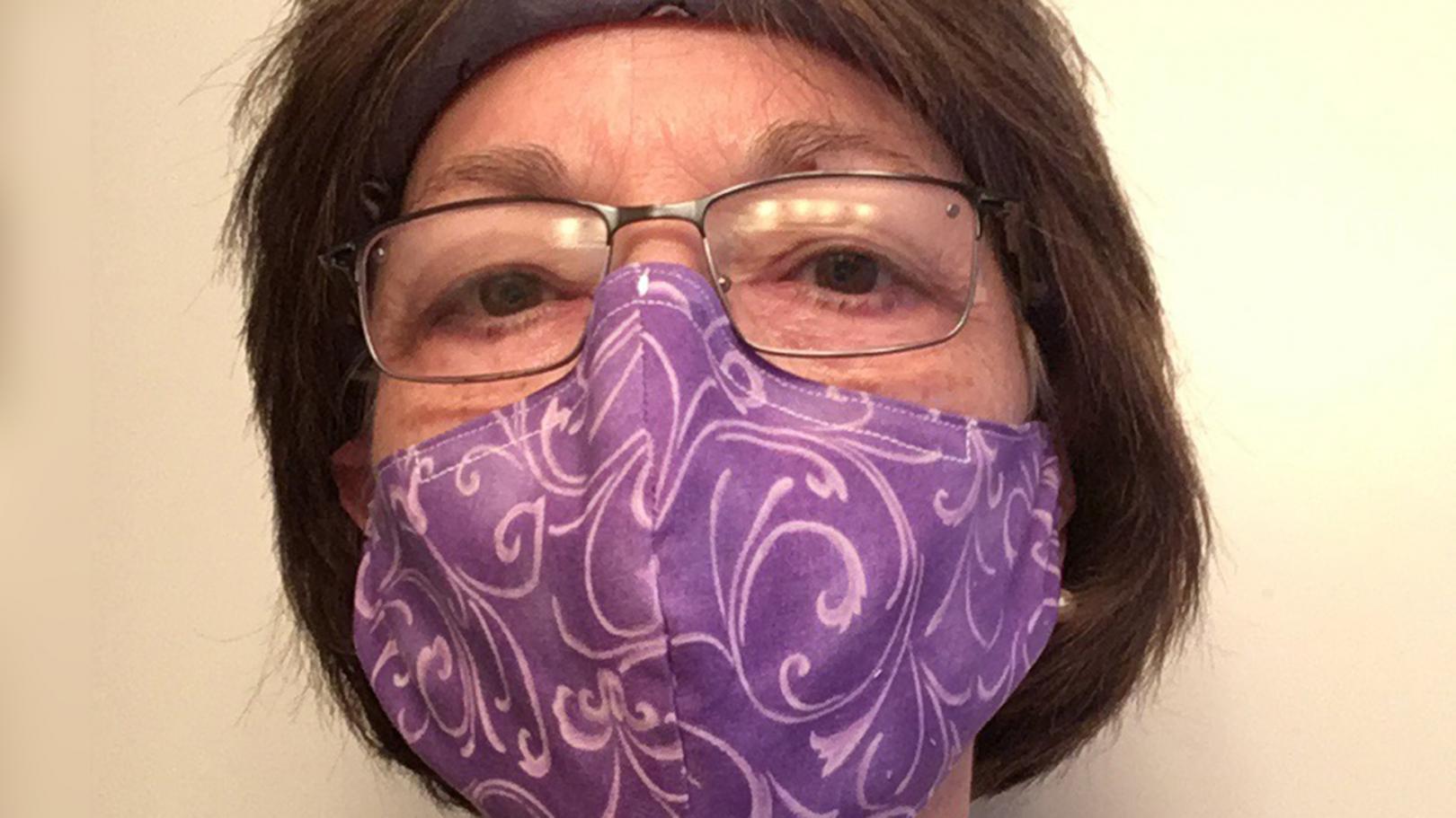 Woman wearing one of the face masks donated to health care workers