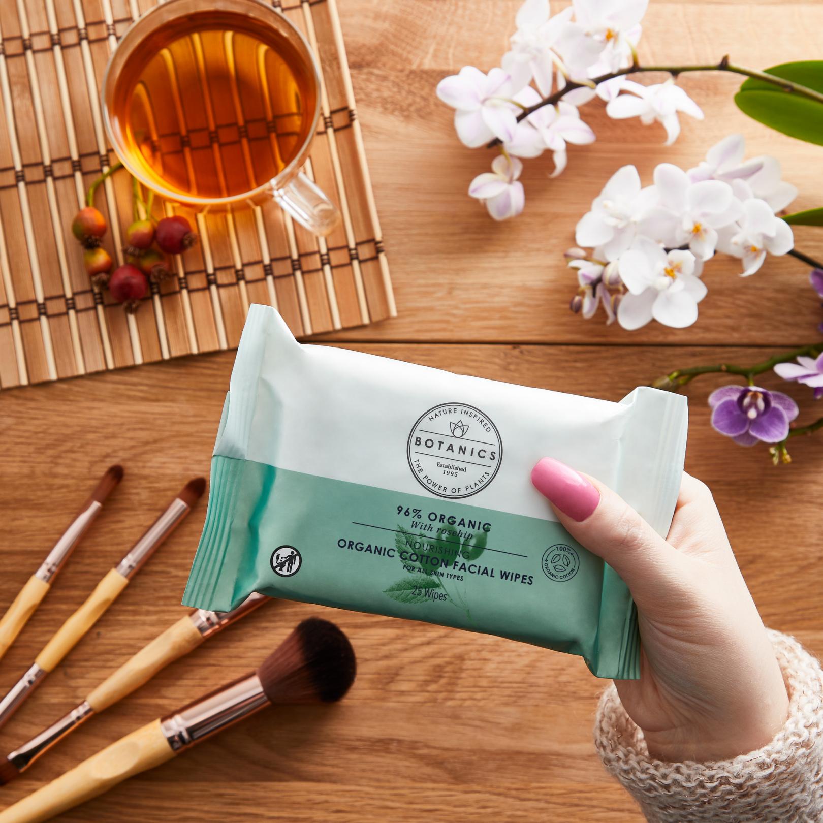 Hand holding Botanics face wipes