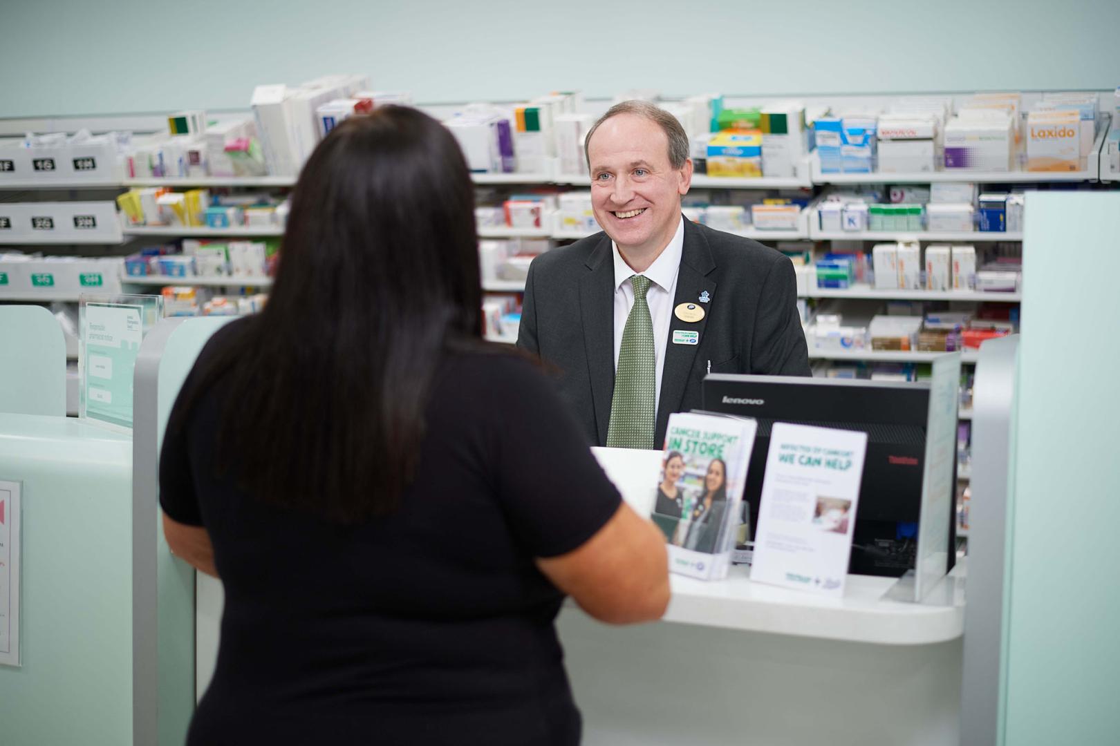 Boots UK team member helping a patient