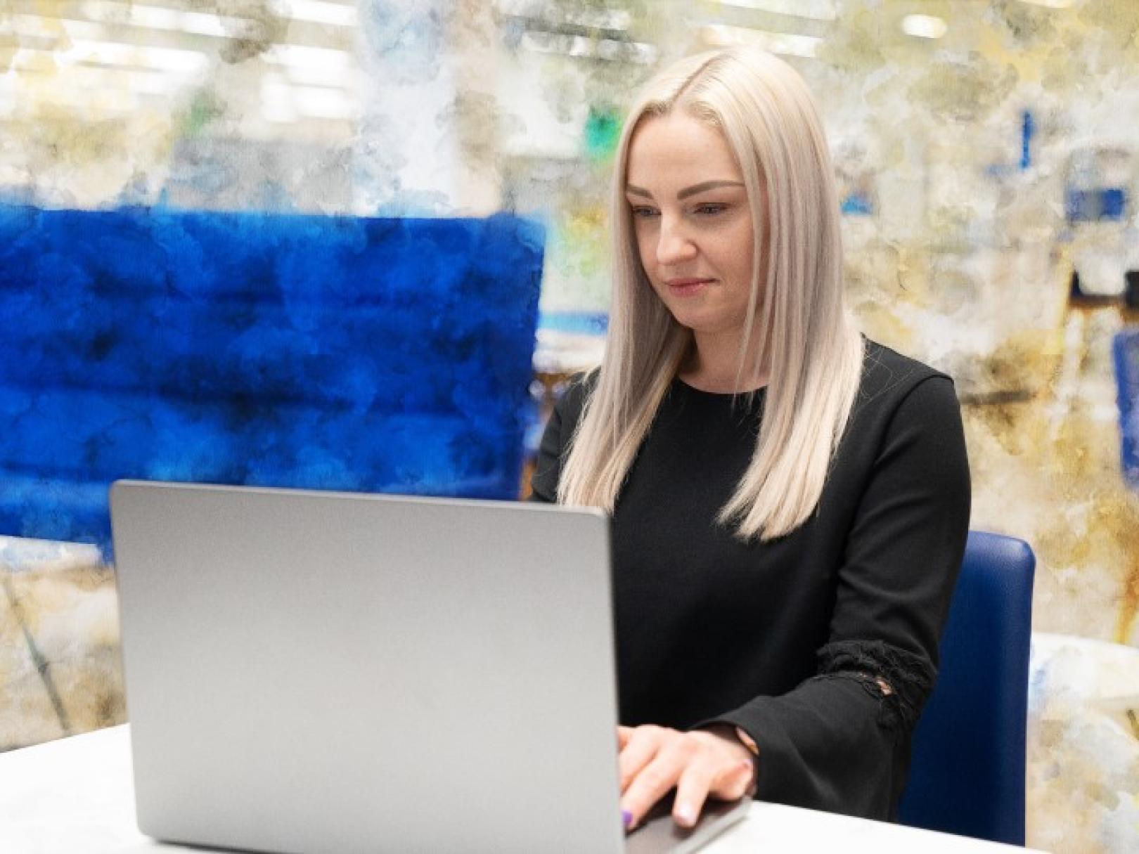 Woman looking at a laptop