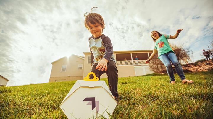 Two children playing in a garden