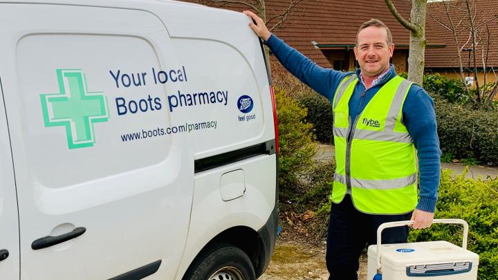 James in front of his van