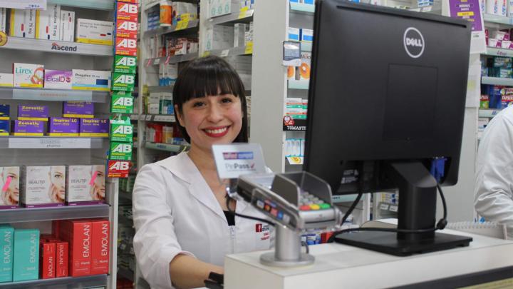 Maribel behind the counter