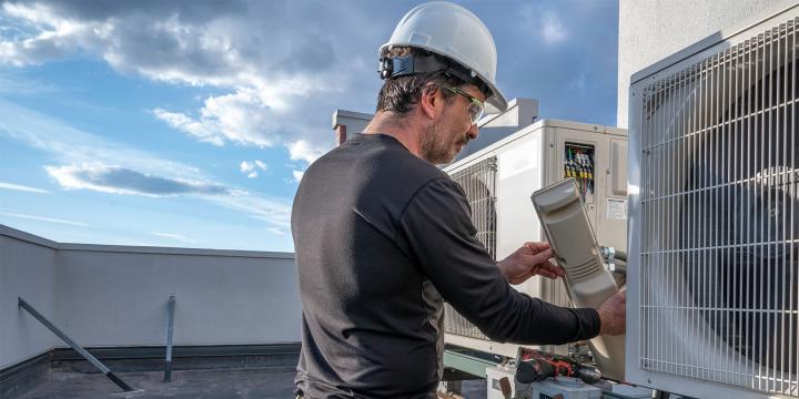 Worker installing HVAC