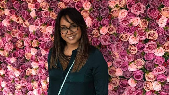 shireen in front of flowers